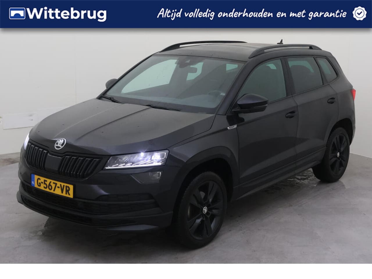 Skoda Karoq - 1.5 TSI ACT 150pk Sportline Business DSG Automaat Virtual cockpit / LM 18 inch / Navigatie - AutoWereld.nl