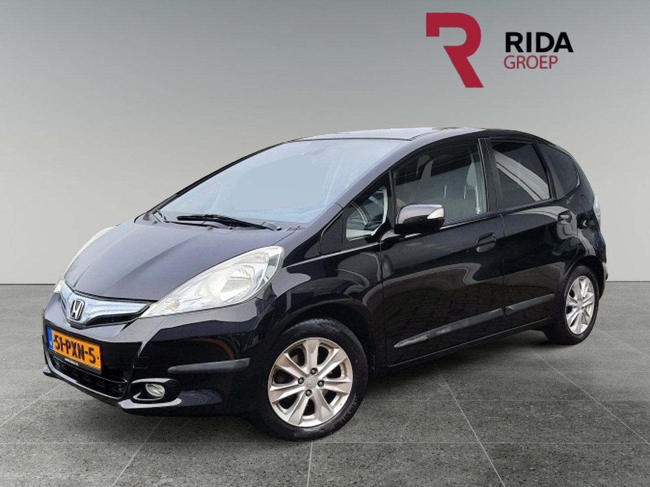 Honda Jazz - 1.4 Hybrid Elegance 1.4 Hybrid Elegance - AutoWereld.nl