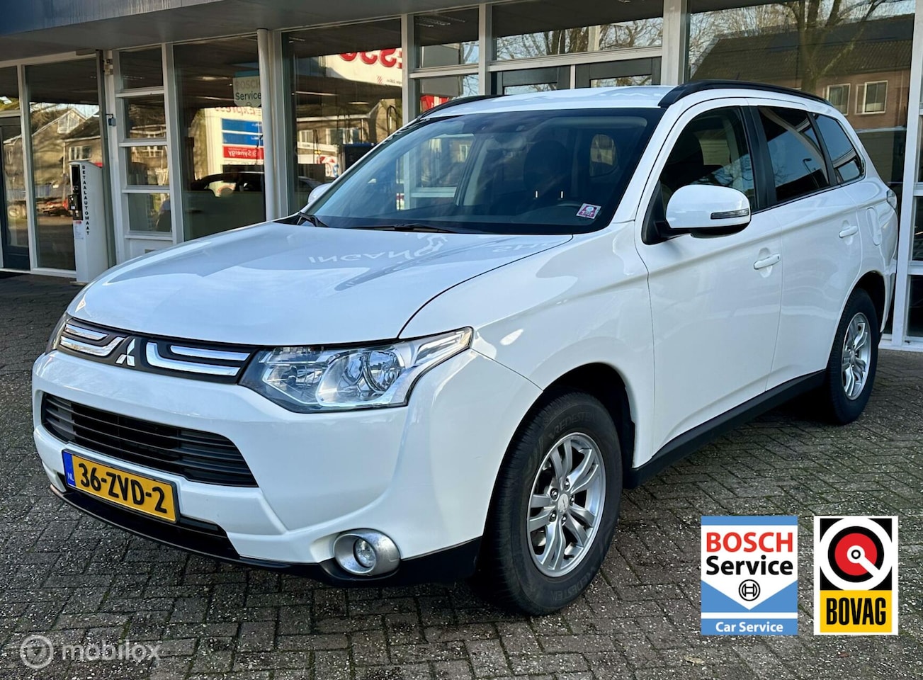 Mitsubishi Outlander - 2.0 Intense Navi, Climat, Bluetooth, LM.. - AutoWereld.nl