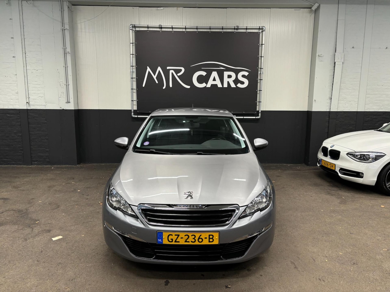 Peugeot 308 - 1.2 PureTech Blue Lease Navi/Airco/Cruise Control - AutoWereld.nl