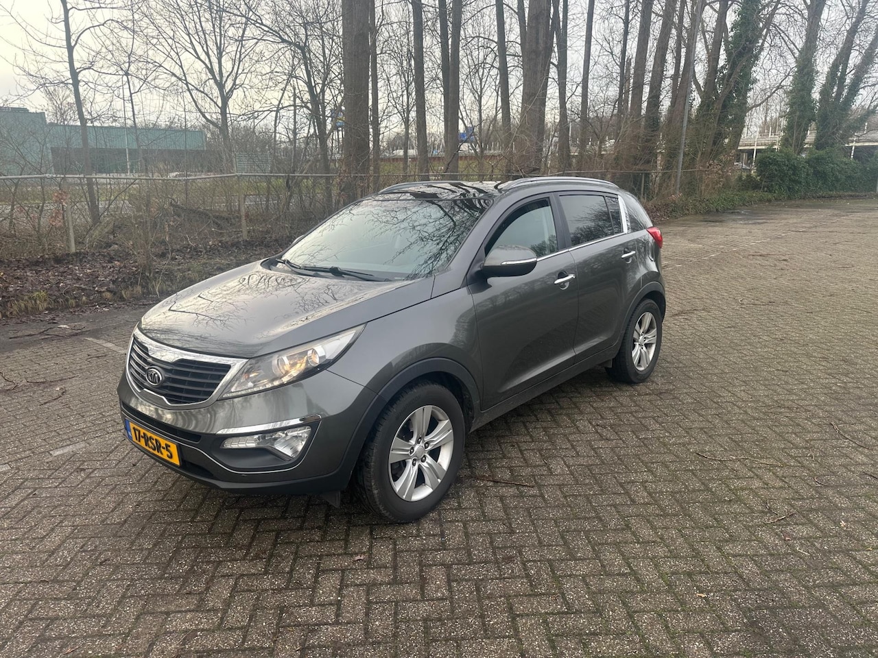 Kia Sportage - 1.6 GDI X-ecutive Plus Pack Airco PDC Panorama - AutoWereld.nl