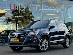 Volkswagen Tiguan - 2.0 TSI Sport&Style 4Motion Lees Tekst