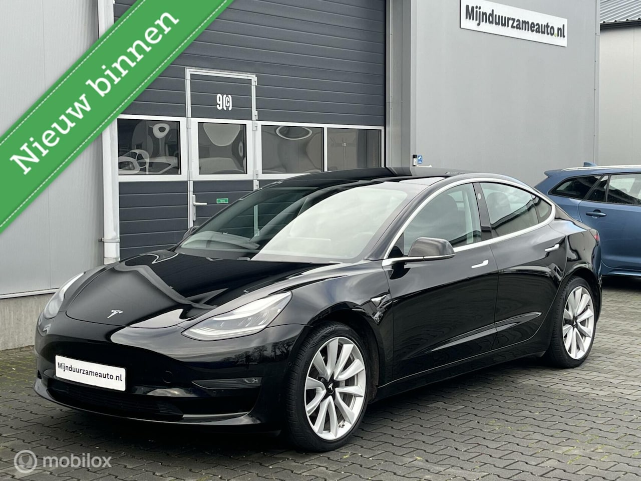 Tesla Model 3 - Long Range RWD Long Range AWD 75 kWh - Trekhaak - 19 inch - AutoWereld.nl