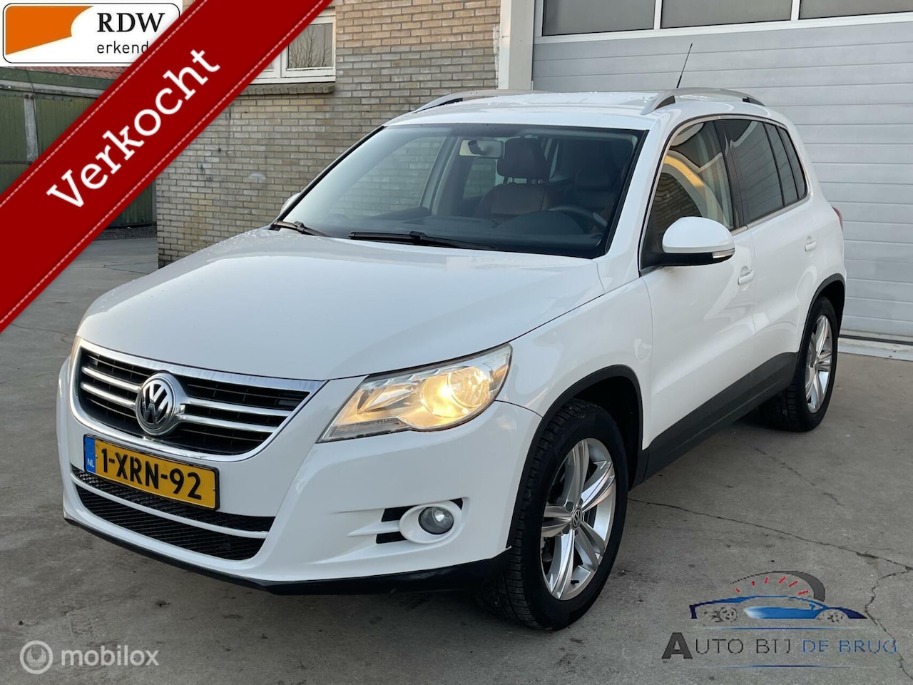 Volkswagen Tiguan - 2.0 TSI Sport&Style 4Motion 170pk Leer Apk - AutoWereld.nl