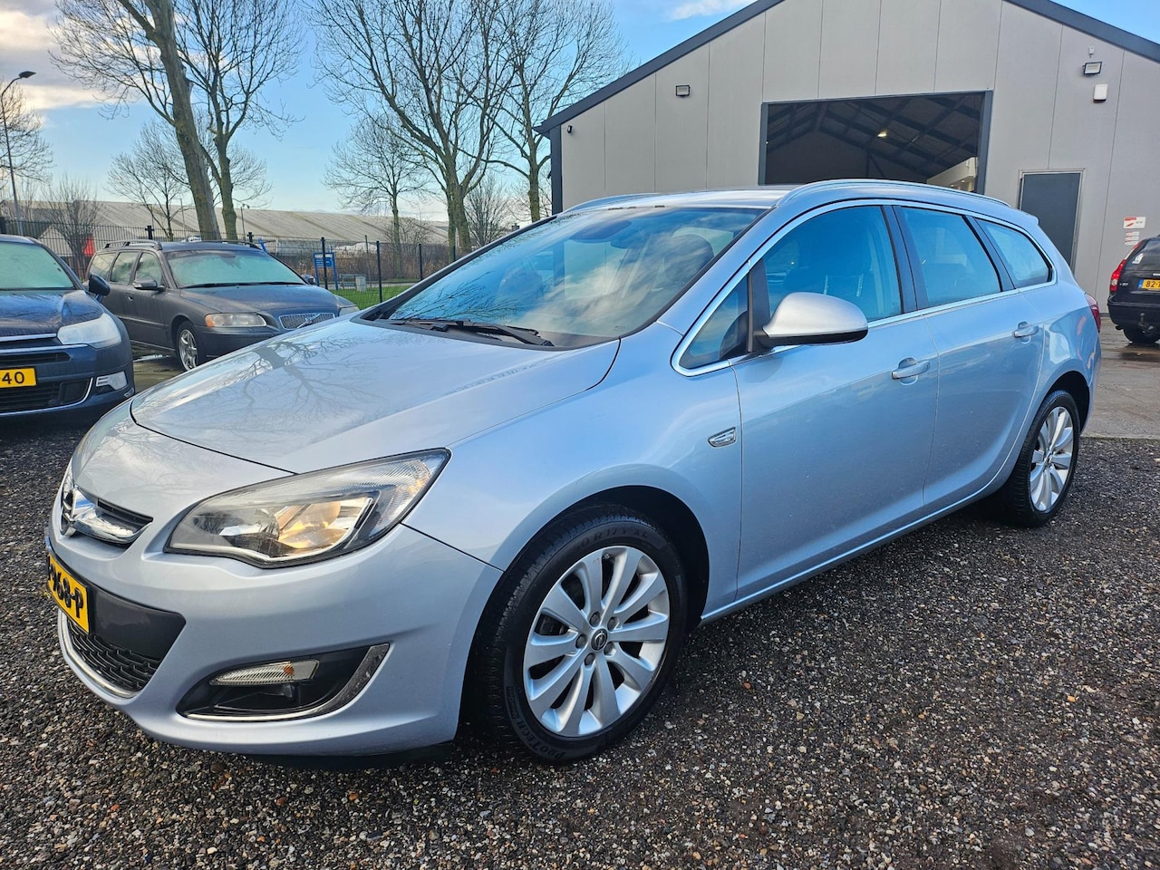 Opel Astra Sports Tourer - 1.4 Turbo Sport + CAMERA LEER NAVI - AutoWereld.nl