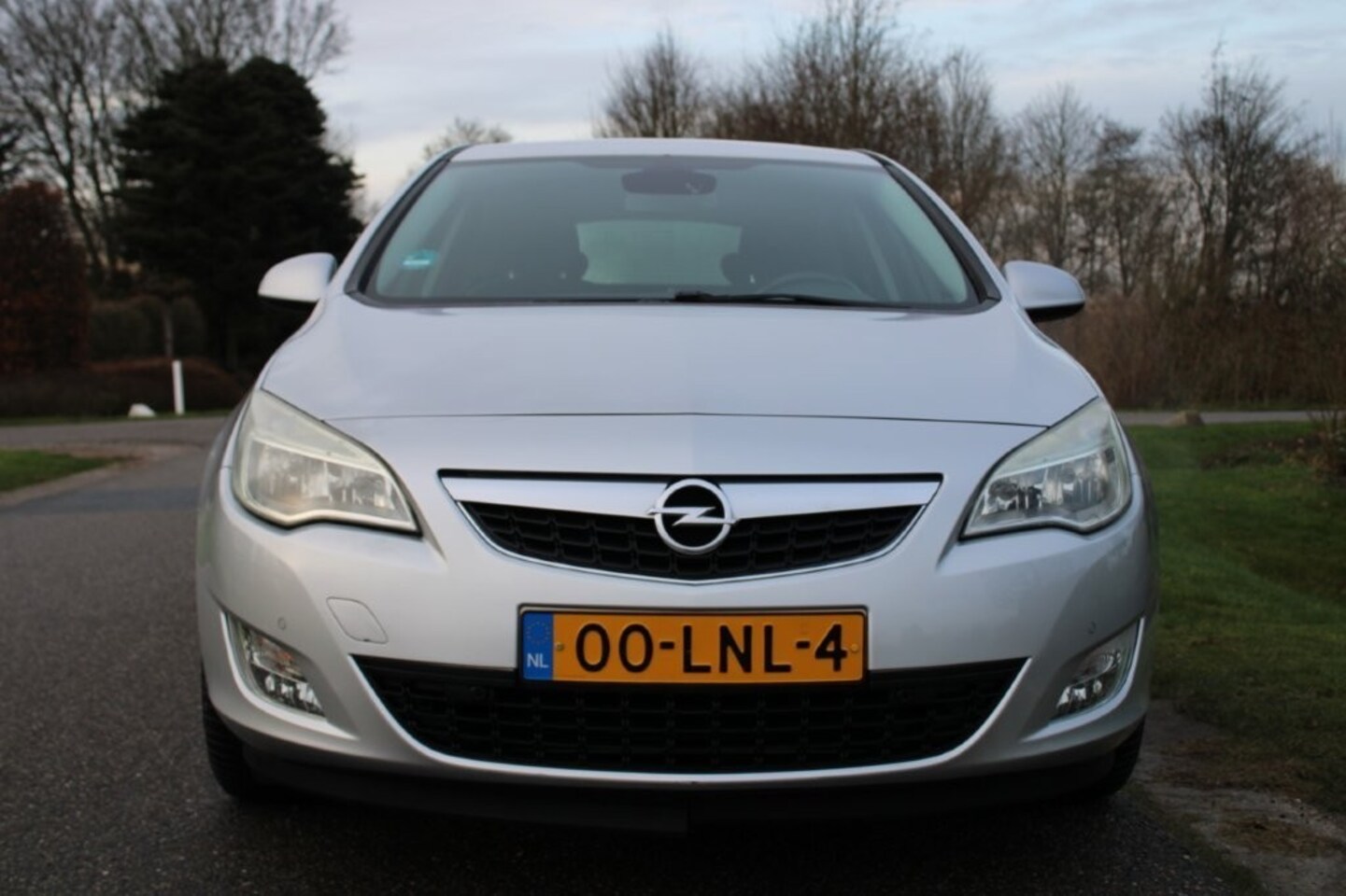 Opel Astra - 1.6i 115pk Automaat Cosmo 5-drs ECC/cruise/navi/PDC - AutoWereld.nl