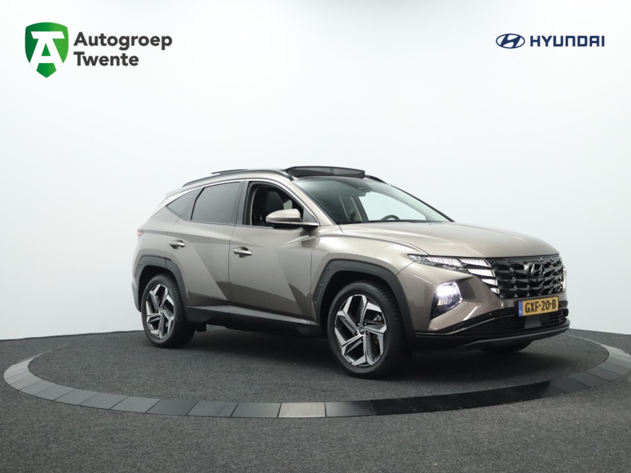 Hyundai Tucson - 1.6 Hybrid Premium Sky | Panoramadak | All season banden | Leder - AutoWereld.nl