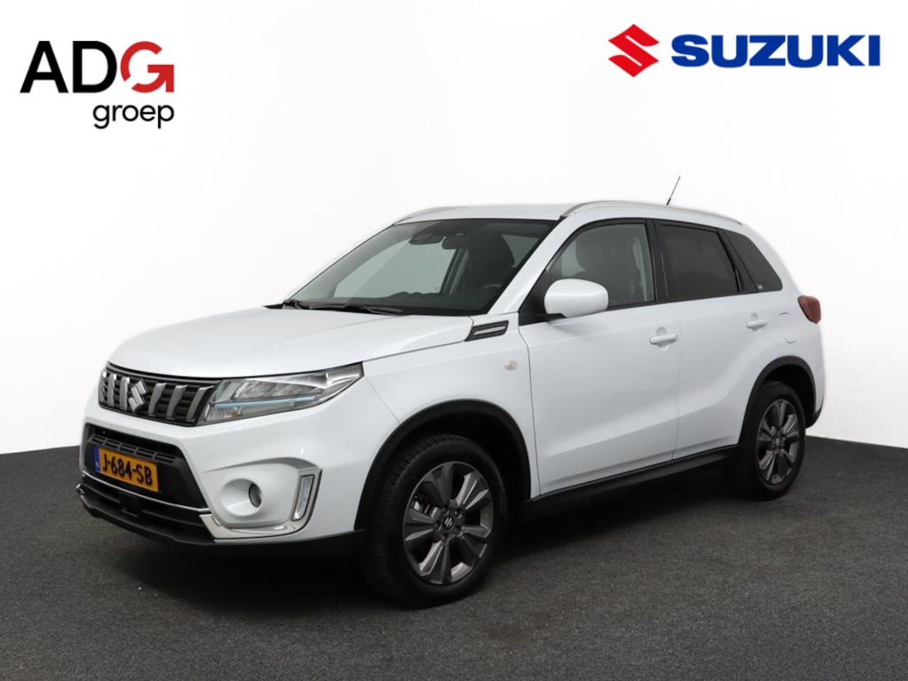 Suzuki Vitara - 1.4 Boosterjet Comfort Smart Hybrid | Climate control | Cruise control | Navigatie | Trekh - AutoWereld.nl