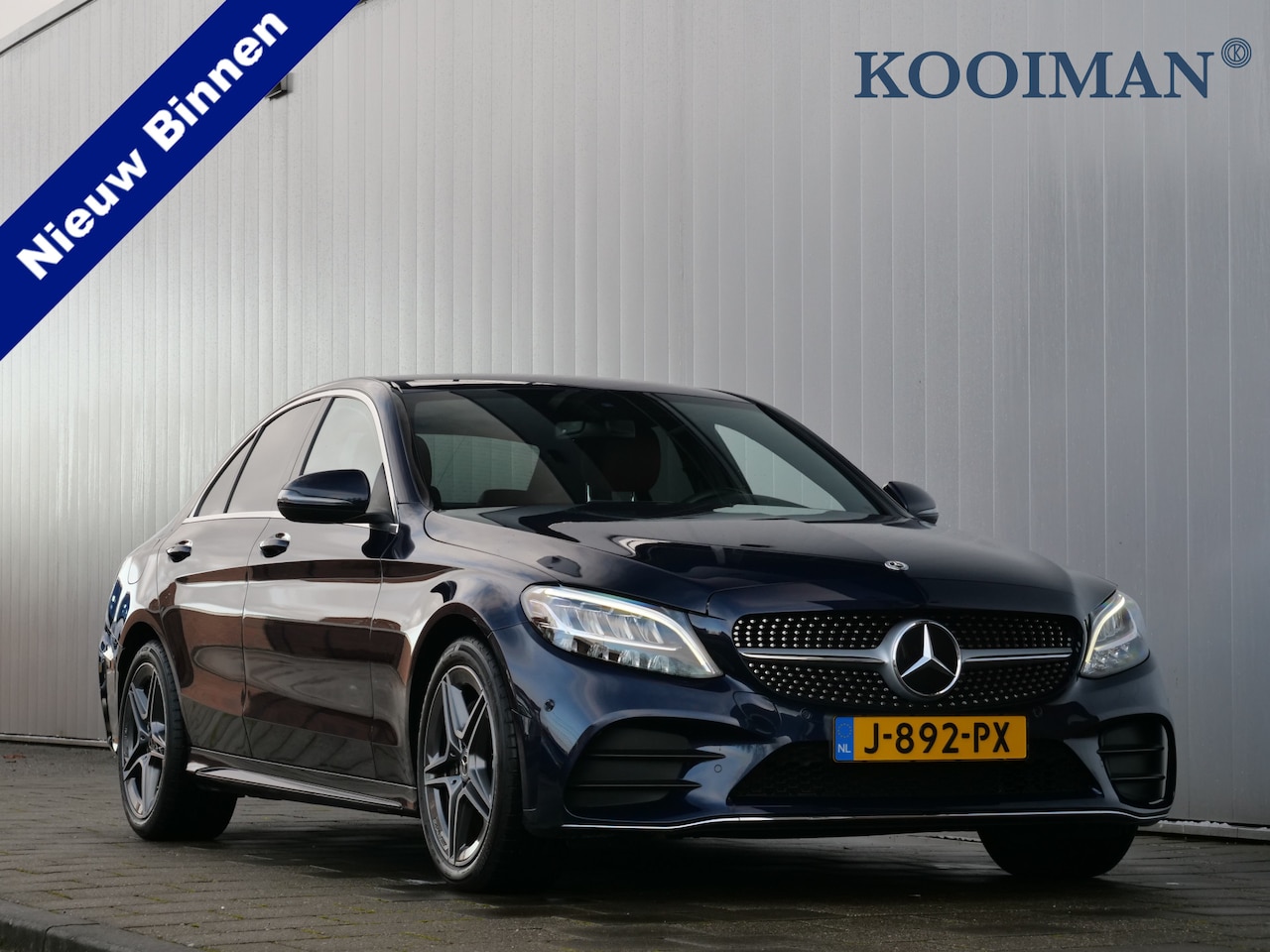 Mercedes-Benz C-klasse - 180 Business Solution 157pk AMG Automaat LED / Leder / Navigatie / Stoelverwarming - AutoWereld.nl