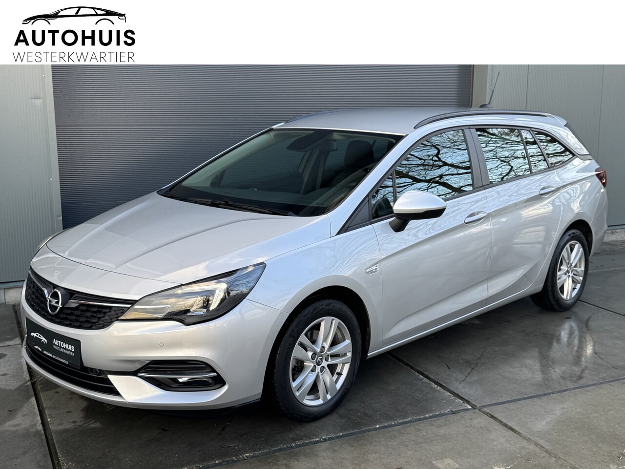 Opel Astra Sports Tourer - 1.2 110pk Turbo Edition Camera Navigatie Climatronic Airco PDC - AutoWereld.nl