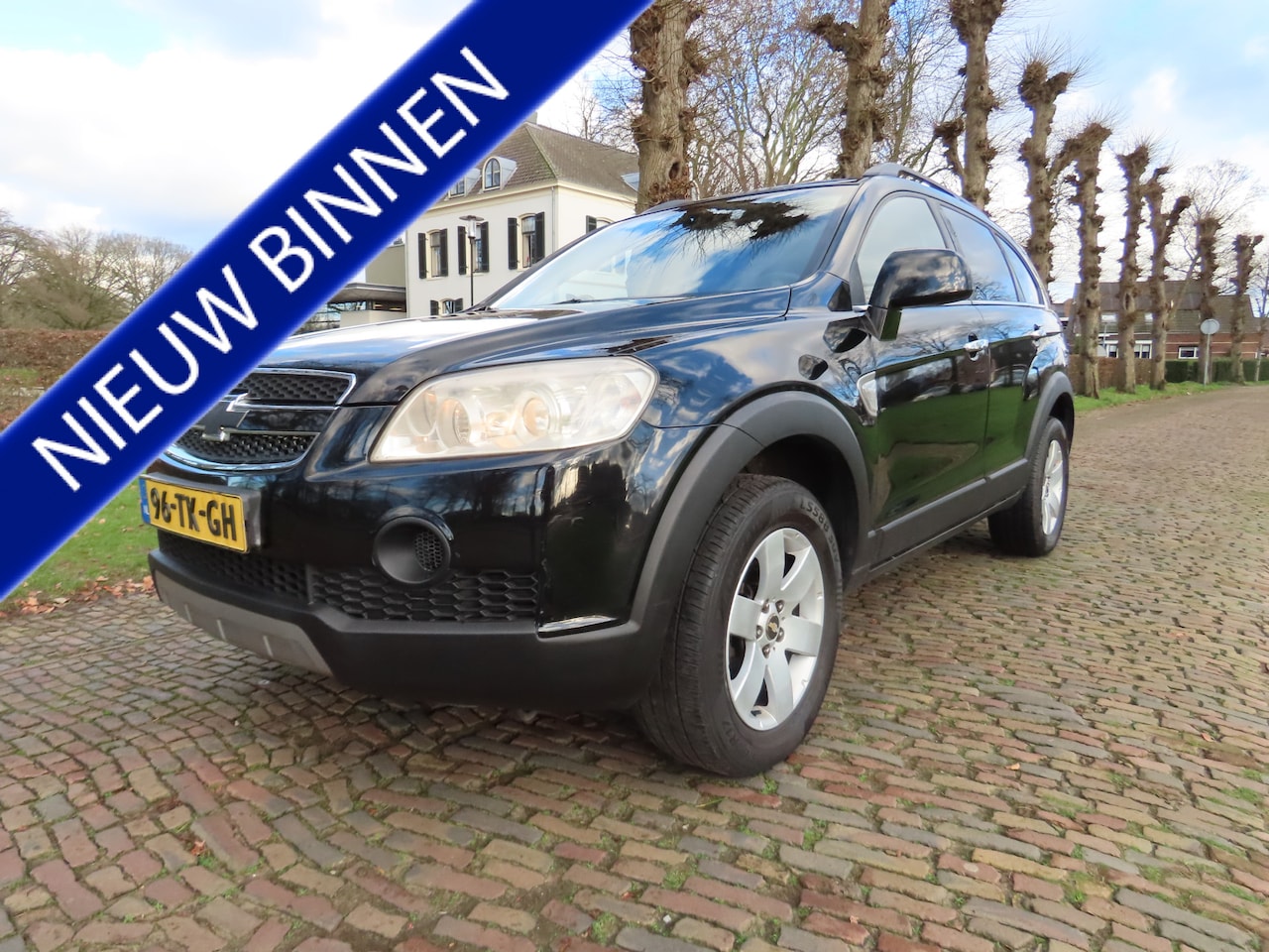 Chevrolet Captiva - 2.4i Style 2WD Airco Cruisecontrol Xenon Pdc 7 Persoons Lm Velgen Trekhaak - AutoWereld.nl