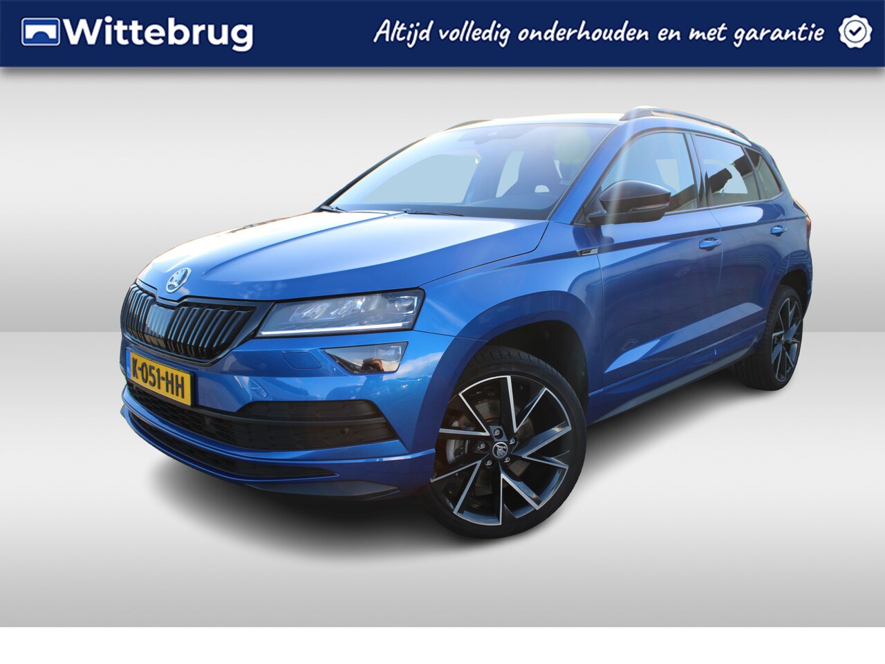 Skoda Karoq - 1.5 TSI 150pk ACT Sportline Business Comfort DSG Automaat Navigatie /Parkeersensoren / LED - AutoWereld.nl