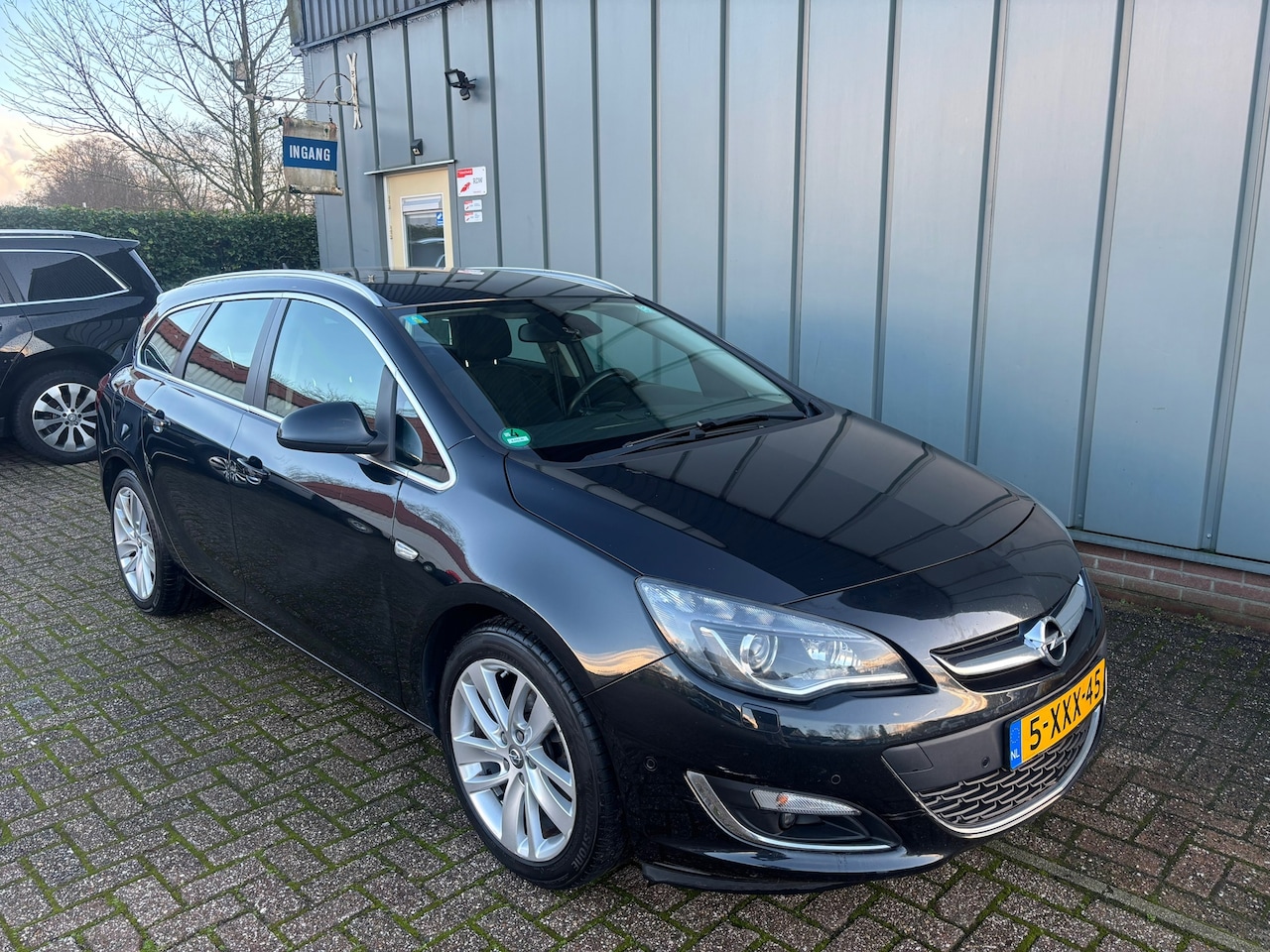 Opel Astra Sports Tourer - 1.6 CDTi Sport + NAP//AIRCO//CRUISE//NAVI//TREKHAAK - AutoWereld.nl