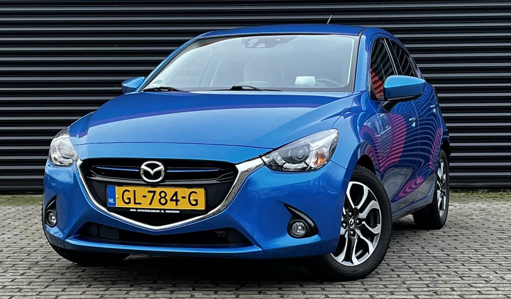 Mazda 2 - 1.5 Skyactiv-G S| Navigatie | Cruise control | Stoelverwarming | 16'' Lichtmetalen velgen - AutoWereld.nl