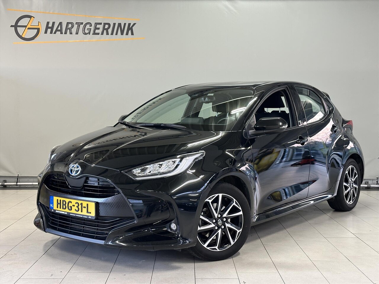 Toyota Yaris - 1.5 Hybrid Comfort Automaat* ECC / Cruise / LMV / Camera / Stoelverwarming - AutoWereld.nl