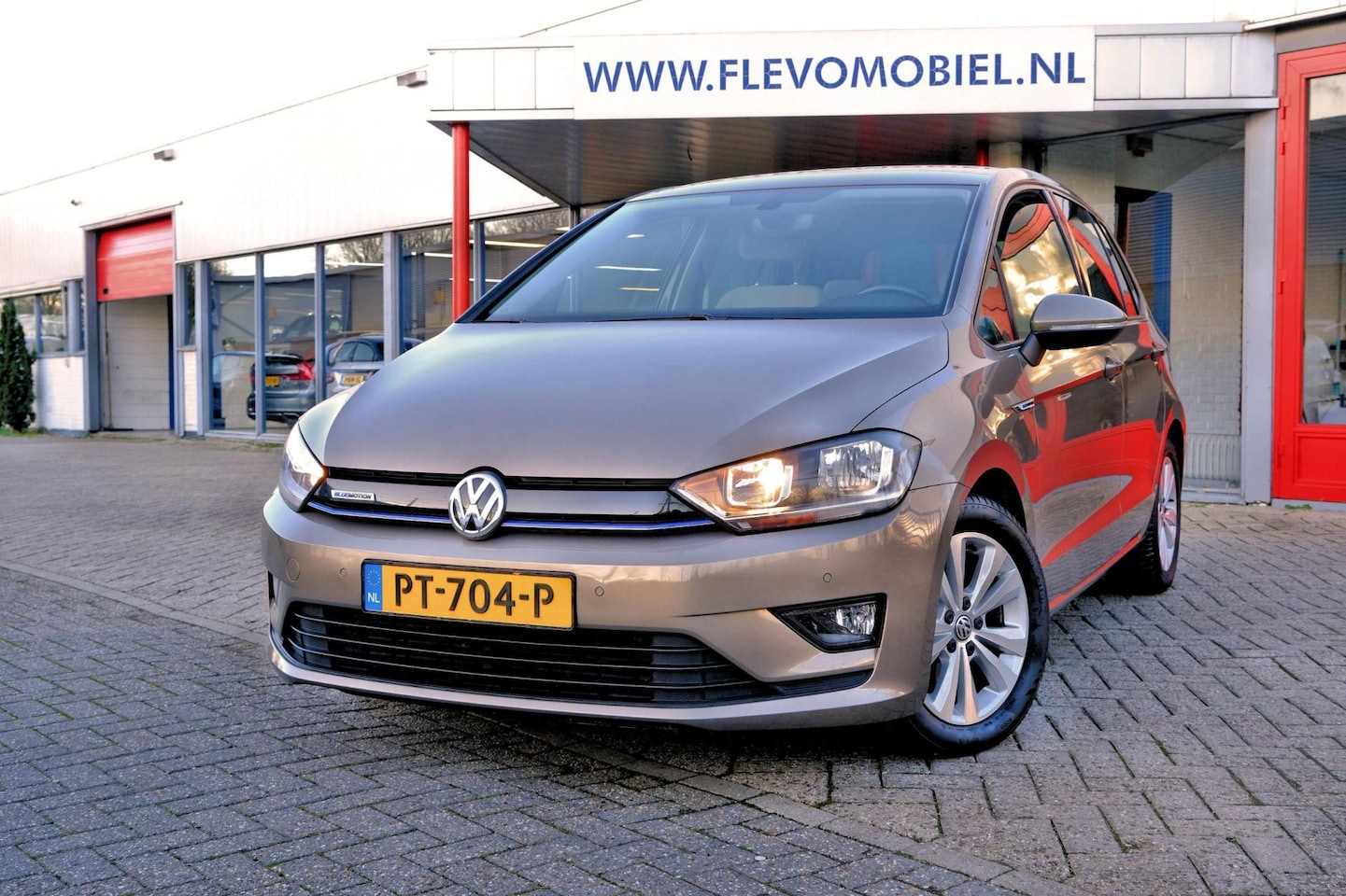 Volkswagen Golf Sportsvan - 1.0 TSI Comfortline Aut. Navi|Clima|LMV|PDC - AutoWereld.nl