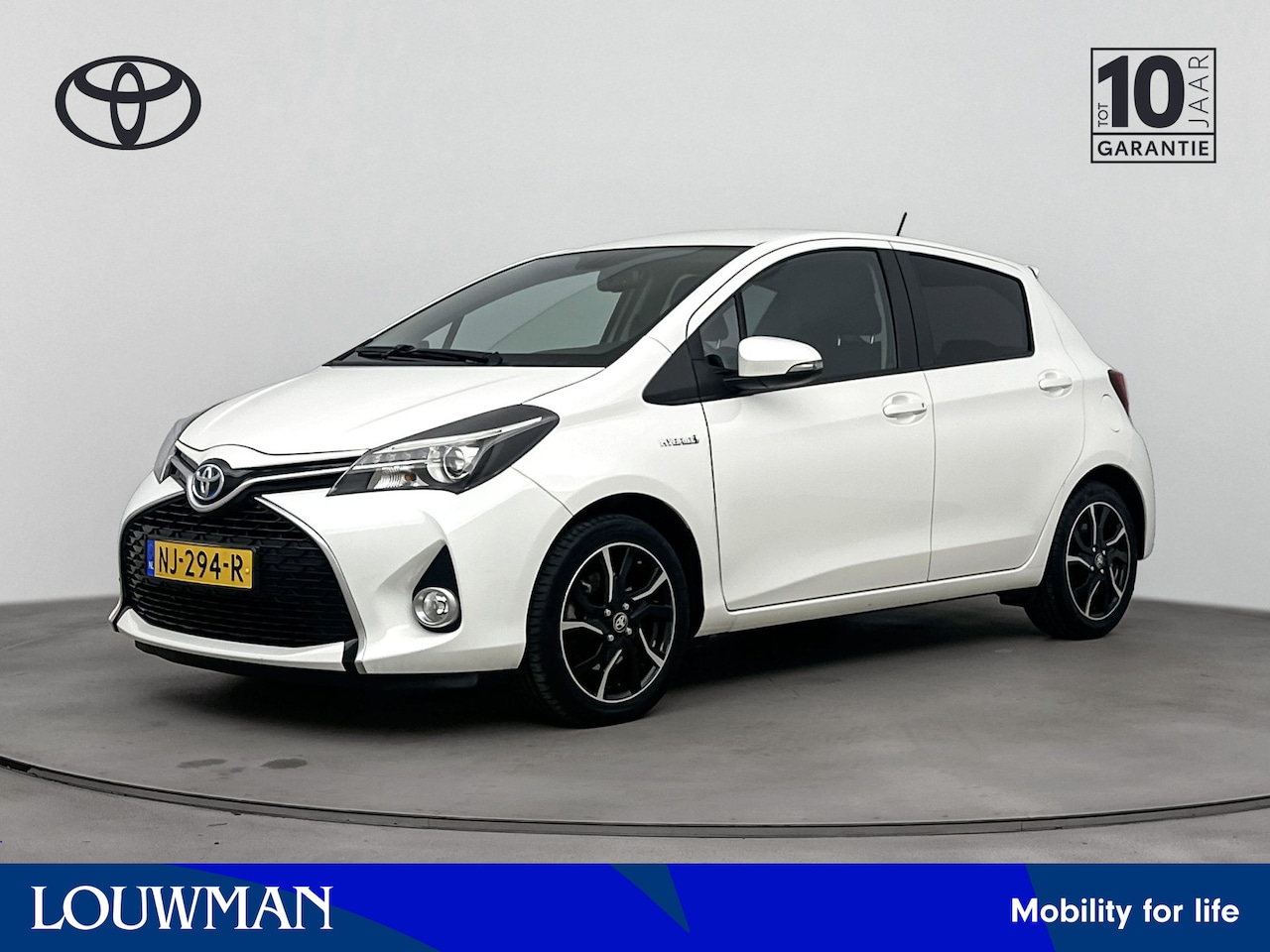 Toyota Yaris - 1.5 Hybrid Lease Bi-Tone Limited | Navigatie | Climate Control | LM velgen | Cruise Contro - AutoWereld.nl