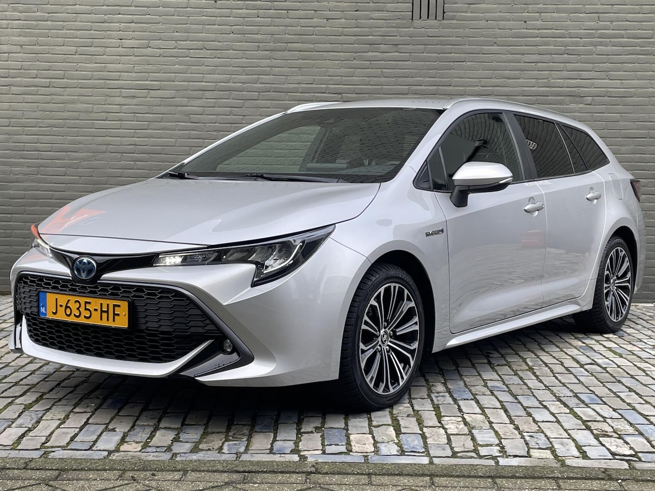 Toyota Corolla Touring Sports - 2.0 HYBRID BUSINESS PLUS I APPLE/ANDROID I P-CAMERA I CLIMATE CONTROL I CRUISE CONTROL - AutoWereld.nl