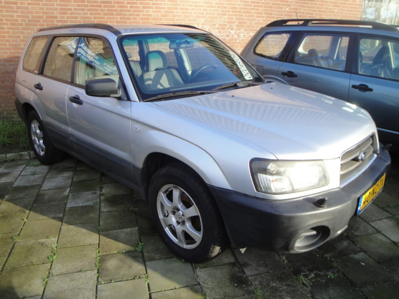 Subaru Forester - 2.0 AWD Zéér netjes, goed onderhouden en compleet + véle extra's! - AutoWereld.nl