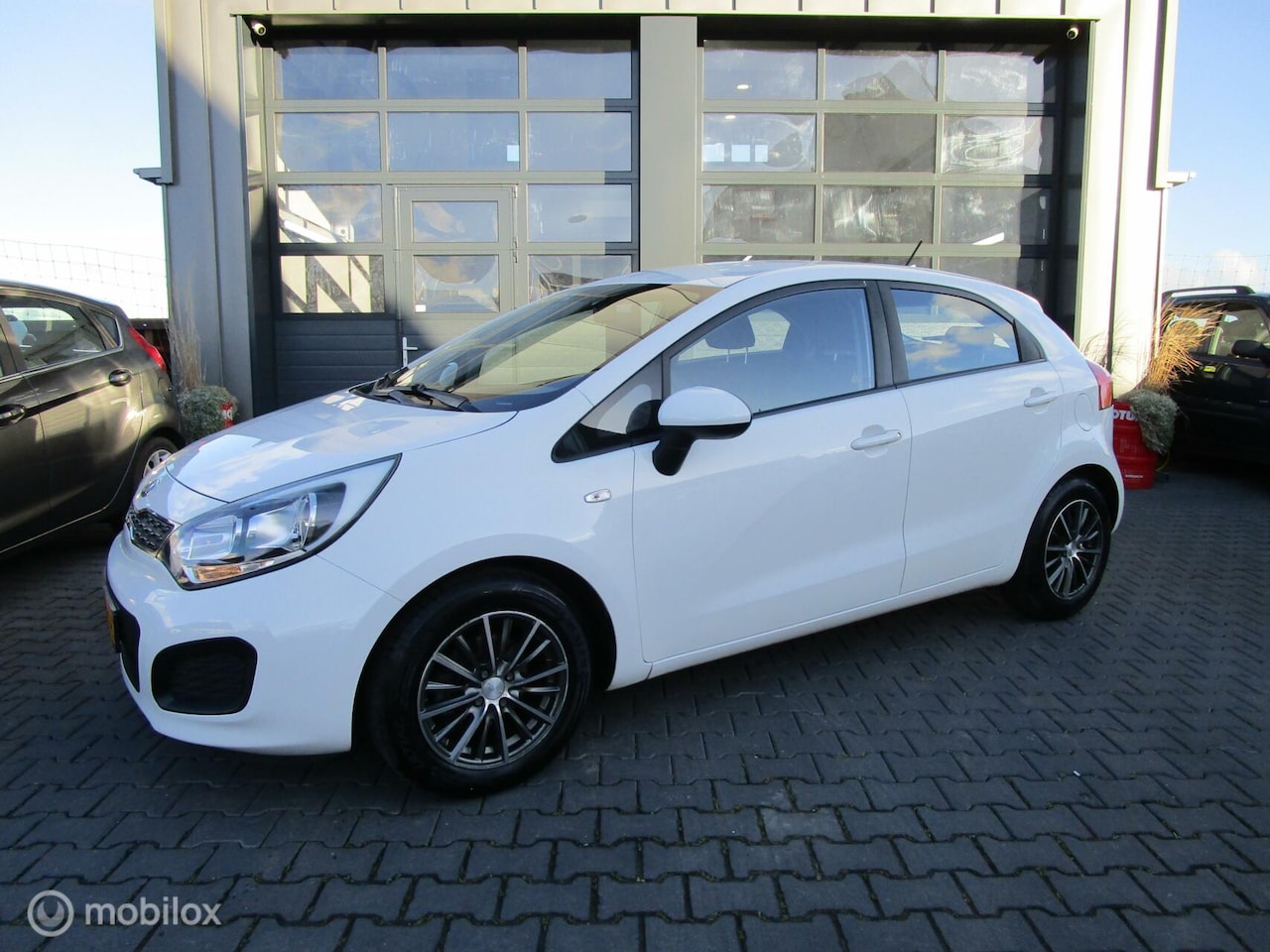 Kia Rio - 1.2 CVVT Comfort Pack 129dkm 5drs org NL Airco Bluetooth - AutoWereld.nl