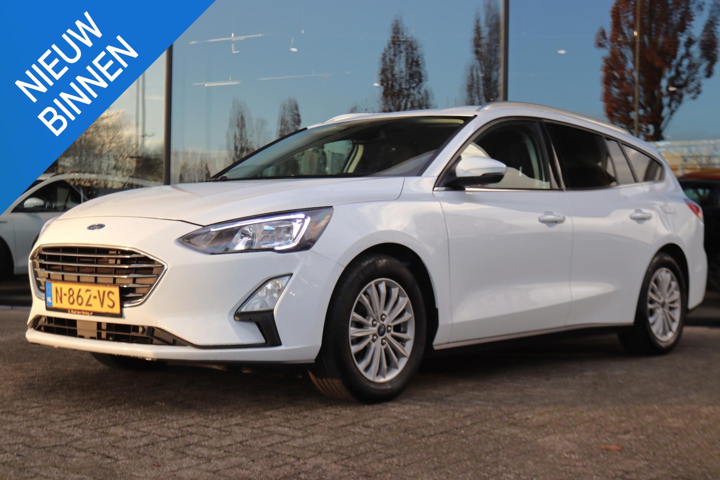 Ford Focus Wagon - 1.0 ECOBOOST AUT. TITANIUM X BUSINESS | LED | TREKHAAK | CARPLAY | KEY-LESS | NAVI | CRUIS - AutoWereld.nl