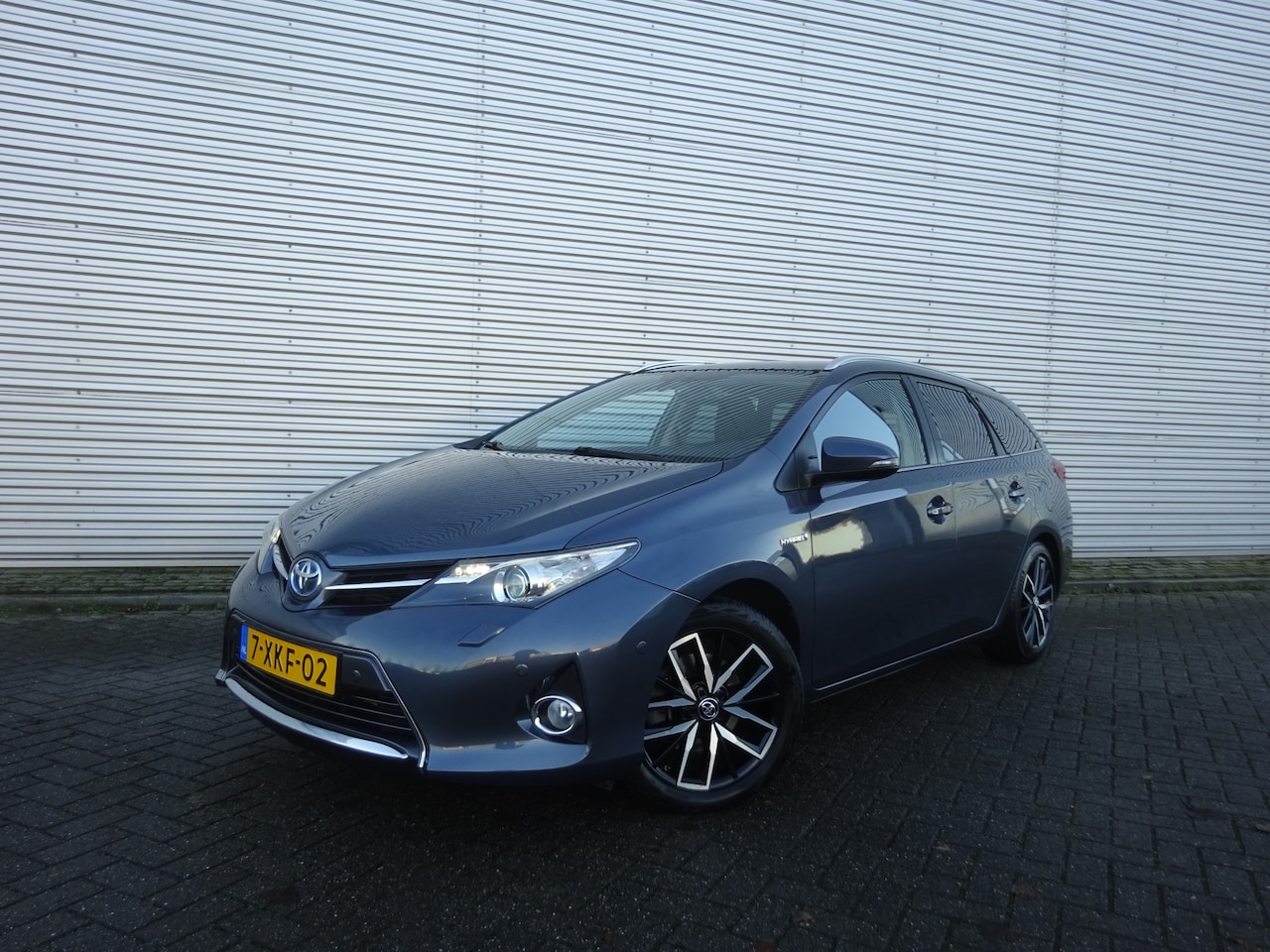 Toyota Auris Touring Sports - 1.8 Hybrid Lease Climate / Navu / Parkeers. / Cruise / Camera / Stoelverw. - AutoWereld.nl