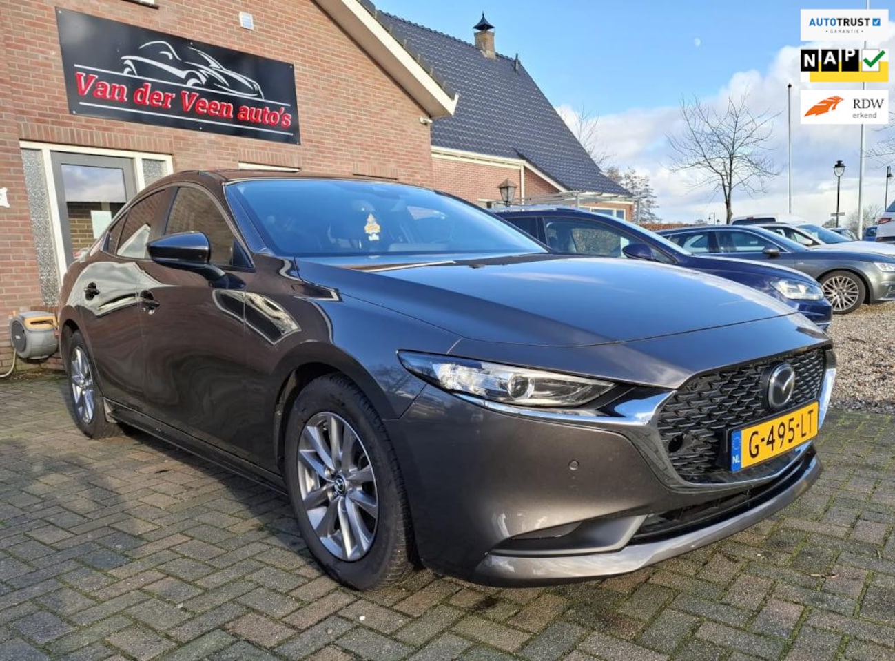 Mazda 3 - 2.0 e-SkyActiv-G M Hybrid 122 Comfort met Bose. Luxe o.a: CarPlay, camera, leder, cruise, - AutoWereld.nl