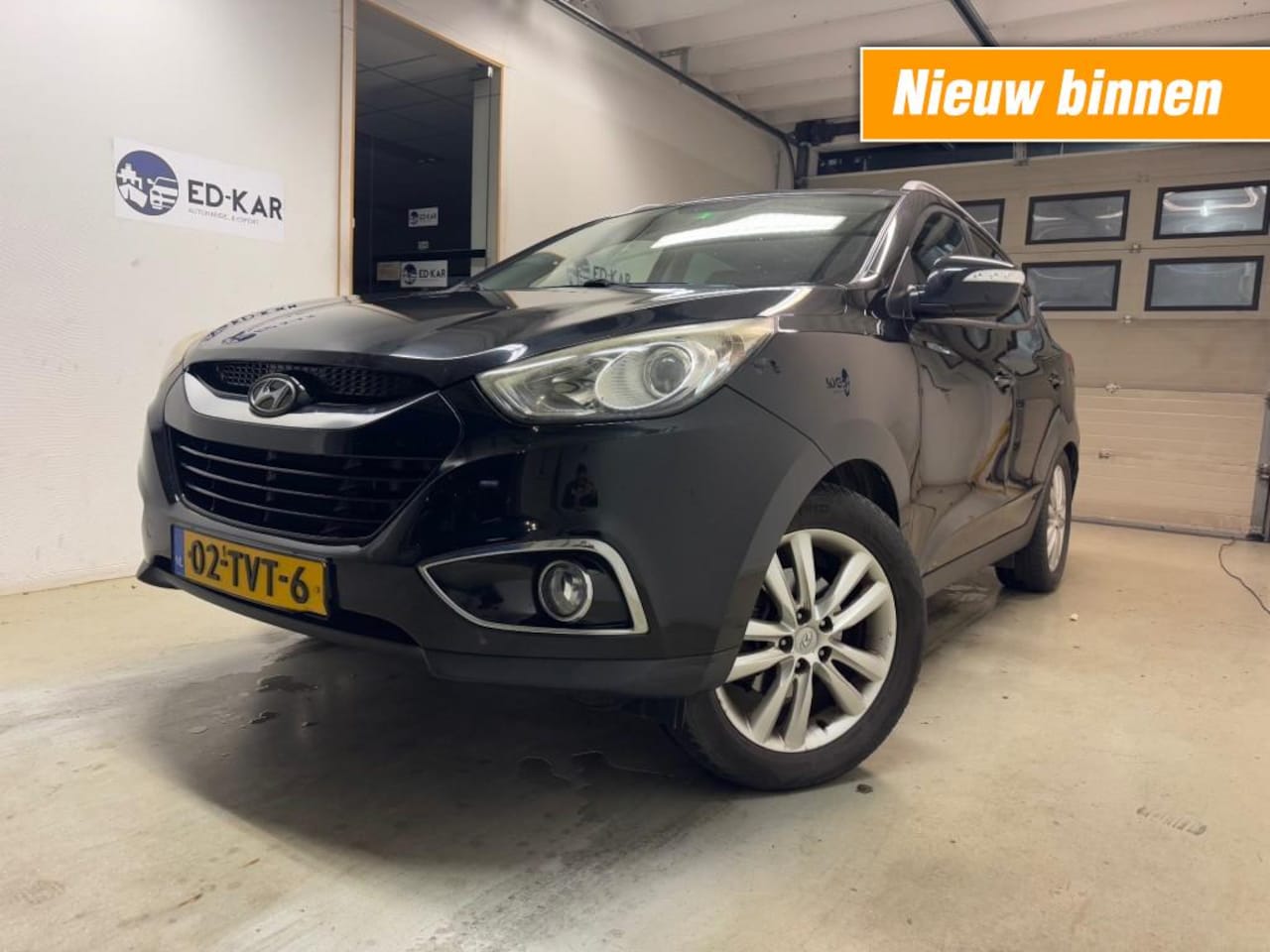 Hyundai ix35 - 2.0 CRDi HP 4WD i-Catcher PANO LEER NAVI CAMERA NAP 2DE Eig - AutoWereld.nl