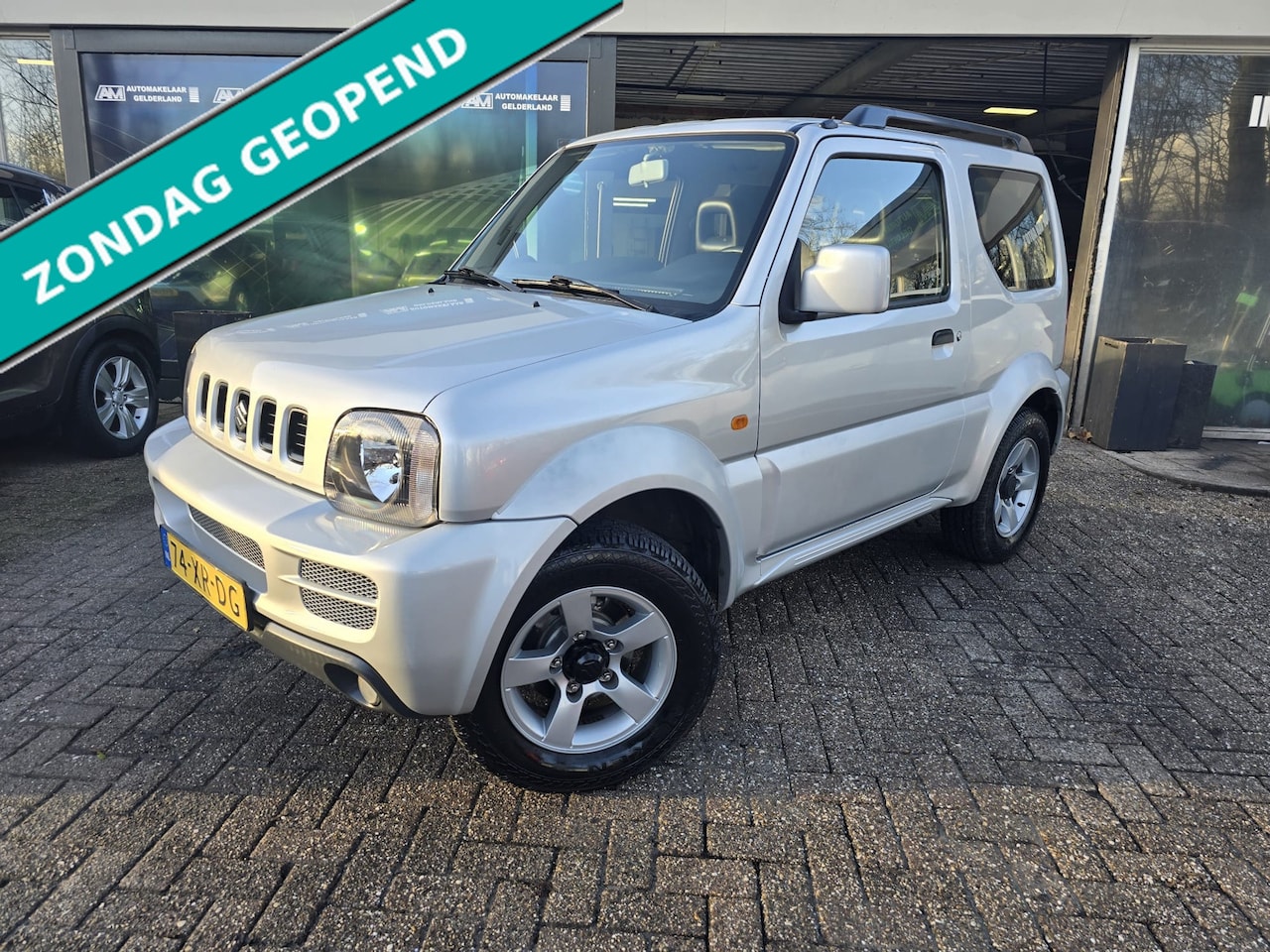 Suzuki Jimny - 1.3 Exclusive | 12 MND GARANTIE | NW APK | AIRCO | 4 X 4 | ELEC RAMEN | - AutoWereld.nl