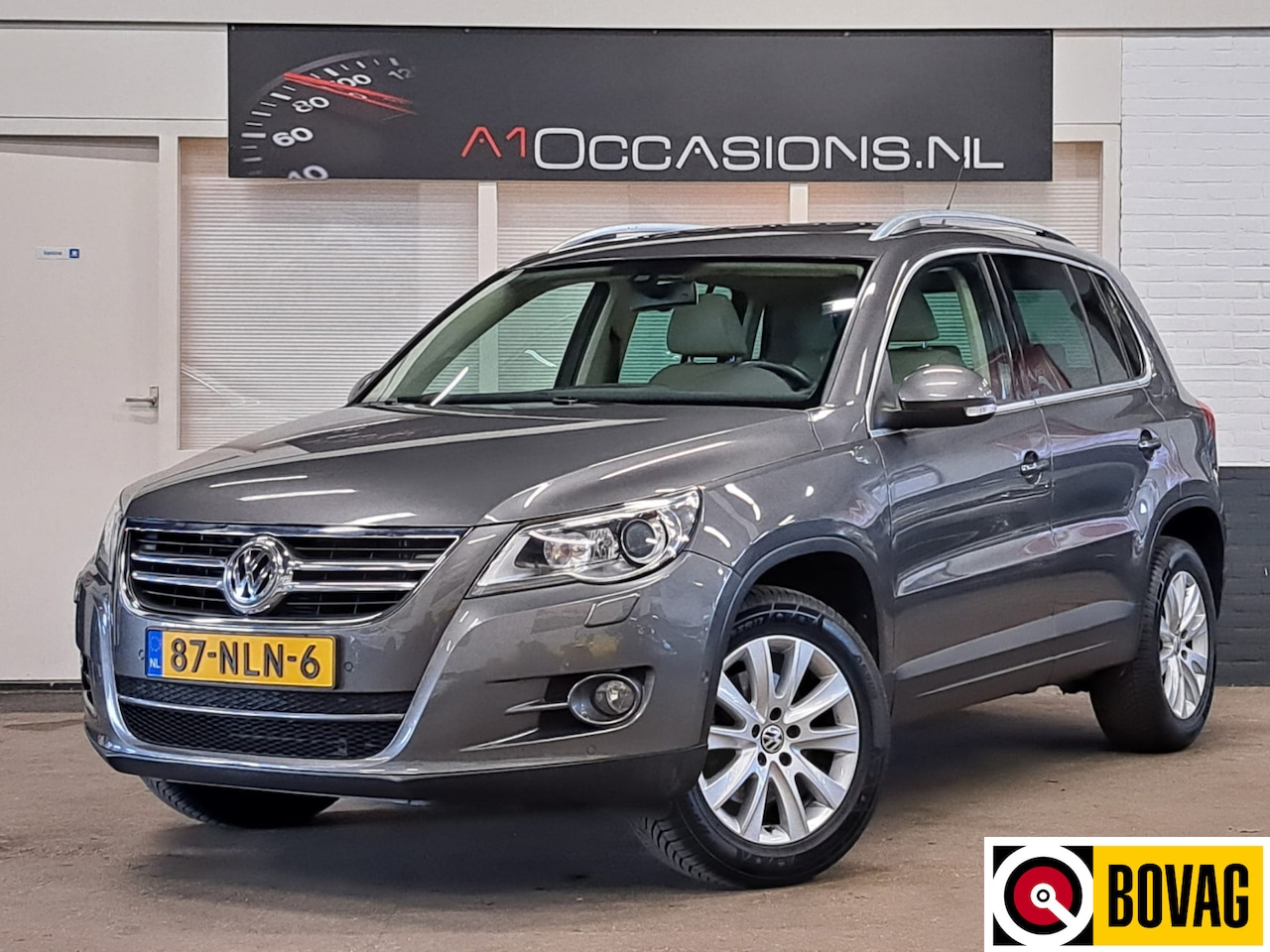 Volkswagen Tiguan - 2.0 TSI Sport&Style 4Motion + LEDER + STOELVERWARMING !! - AutoWereld.nl