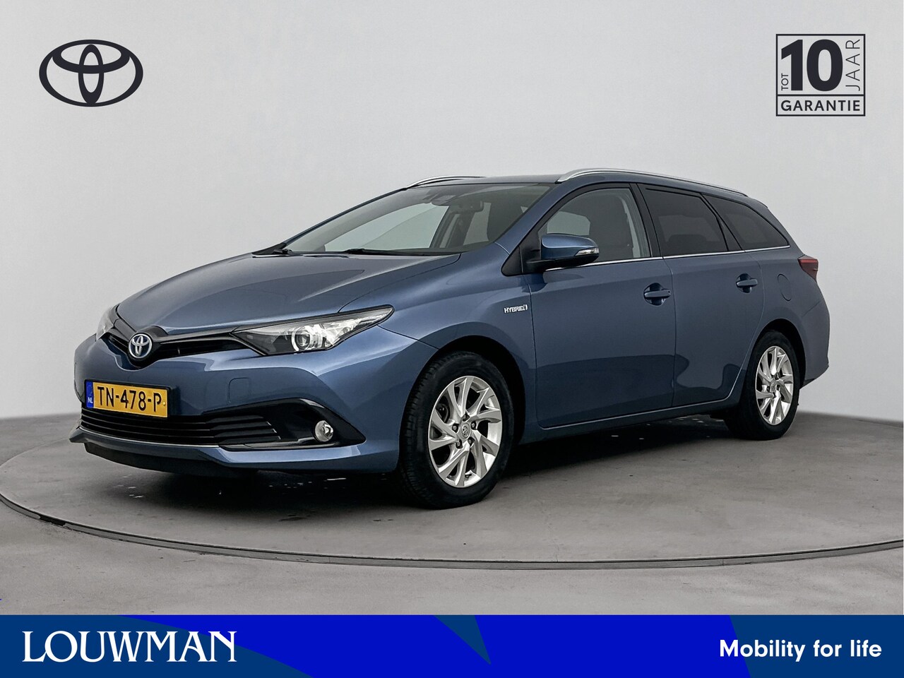 Toyota Auris Touring Sports - 1.8 Hybrid Energy Plus | Navigatie | Climate Control | Cruise Control | Trekhaak | Parkeer - AutoWereld.nl