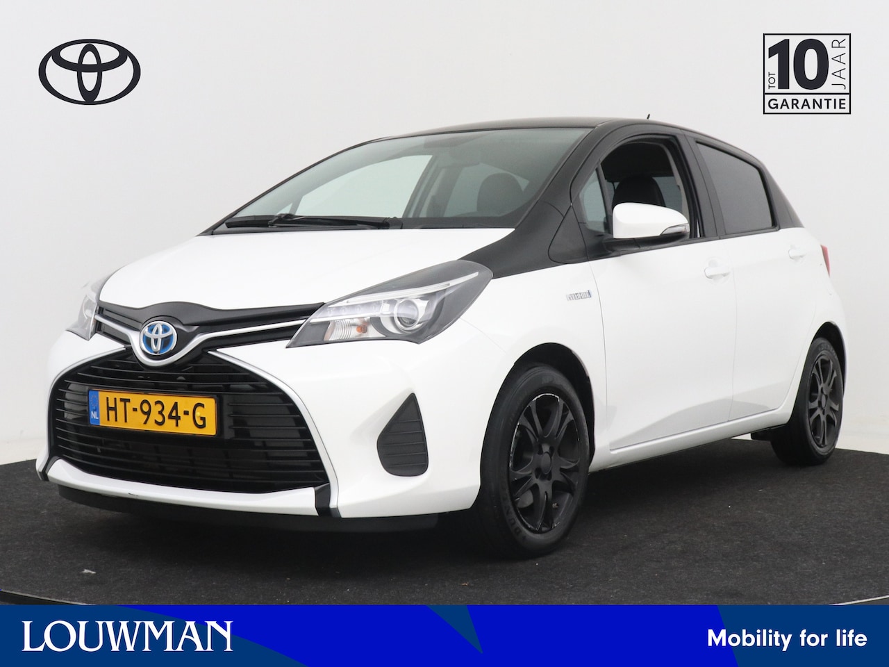 Toyota Yaris - 1.5 Hybrid Aspiration Bi-Tone | Navigatie | Camera | Climate Control | Leder | Navigatie | - AutoWereld.nl