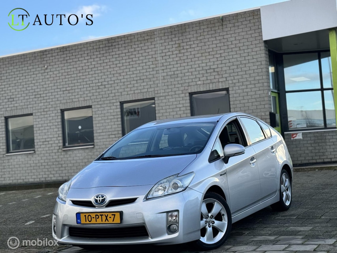 Toyota Prius - 1.8 Aspiration|Head-up Keyless Clima Cruise - AutoWereld.nl