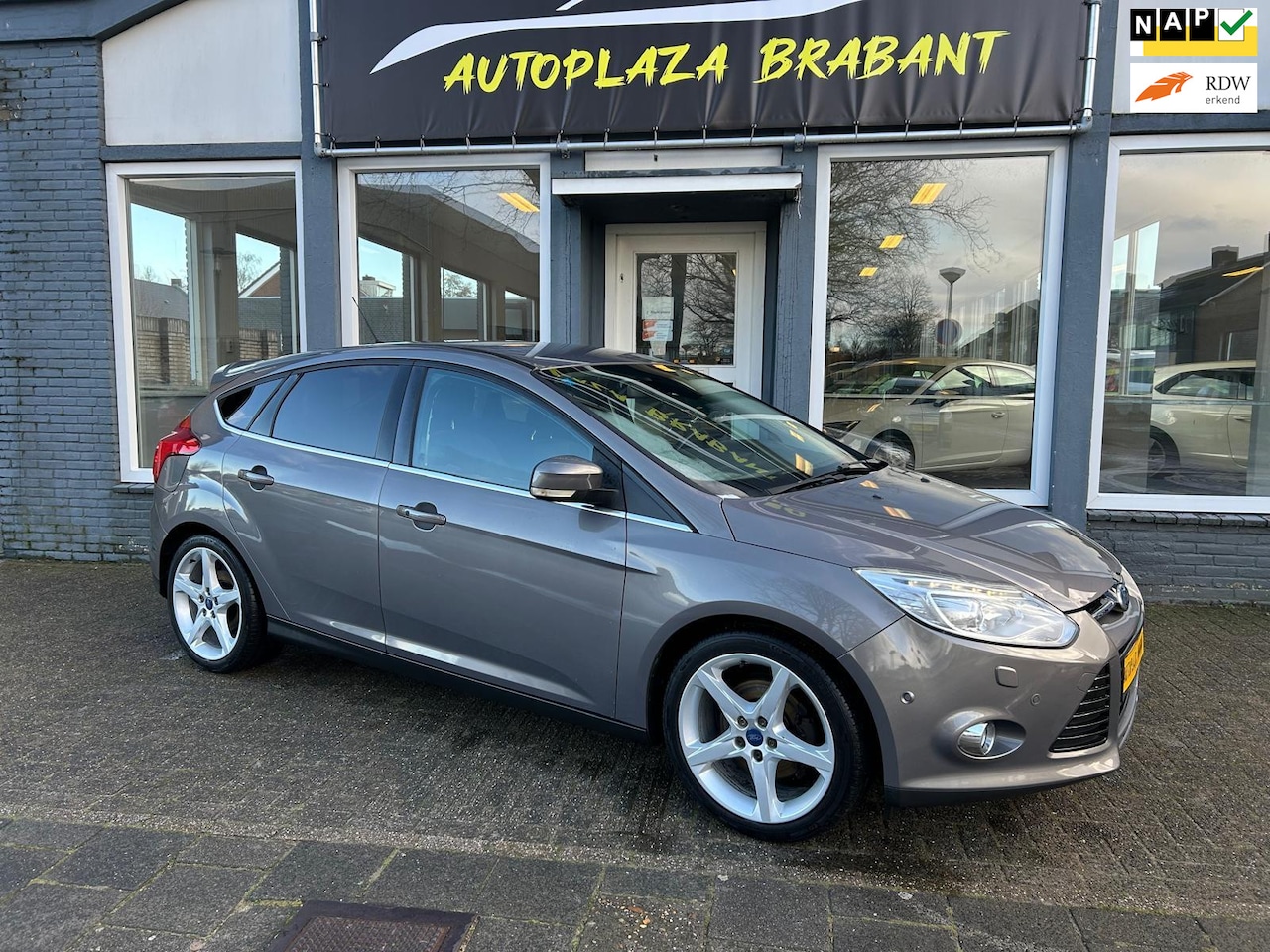 Ford Focus - 1.6 EcoBoost Titanium/ CRUISE/ CLIMA/ STOELVERW/ 18 INCH/ PDC/ NAVI/ BLUETOOTH/ 182 PK - AutoWereld.nl