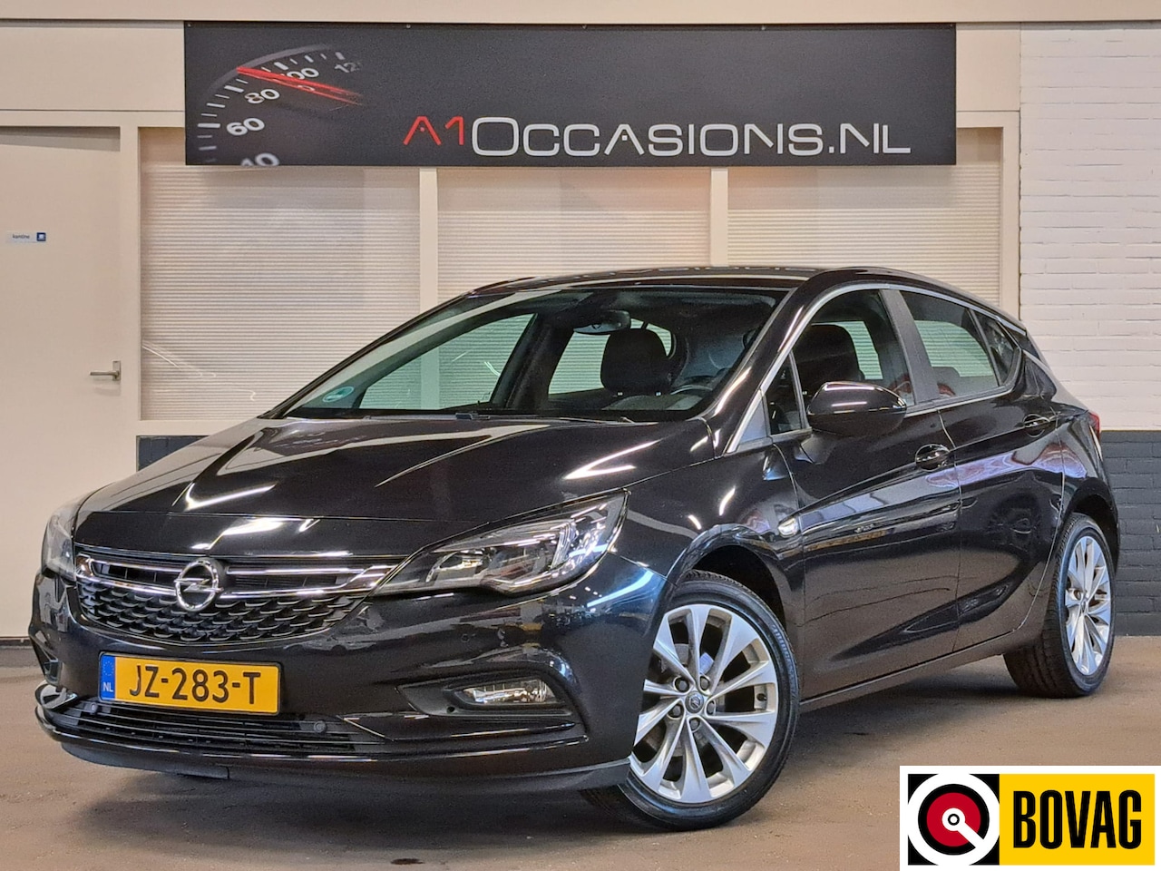 Opel Astra - 1.4 Edition + NAVI - AutoWereld.nl