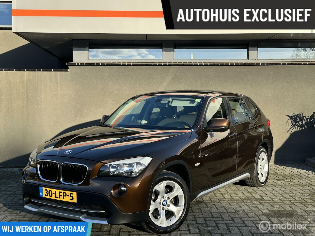 BMW X1 - sDrive18i / Hoge instap / Nieuwstaat / Top onderhoud - AutoWereld.nl