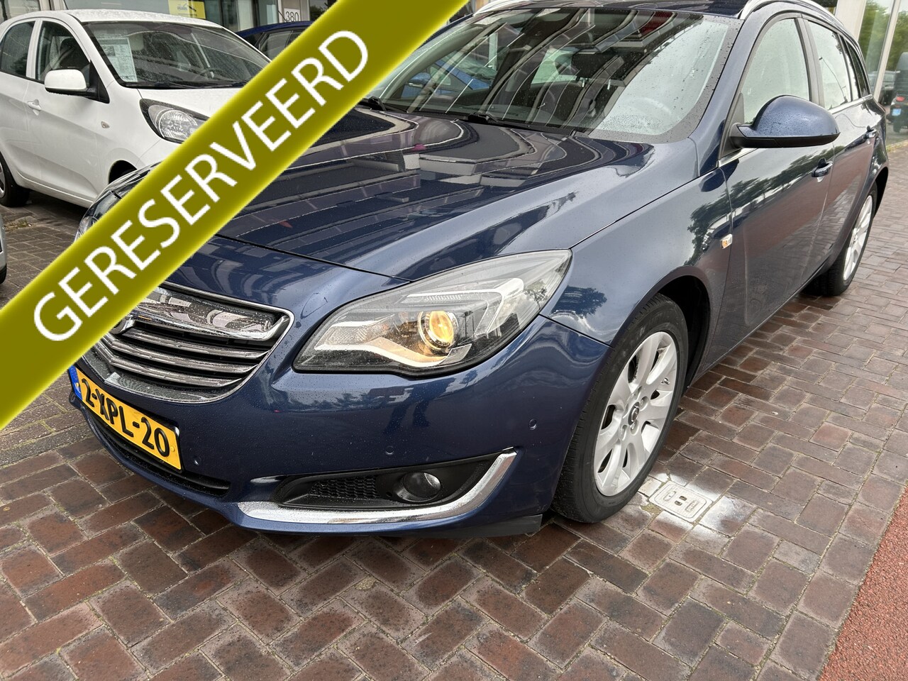 Opel Insignia Sports Tourer - 1.4 T EcoFLEX Edition navi xenon airco/ecc keurige auto - AutoWereld.nl