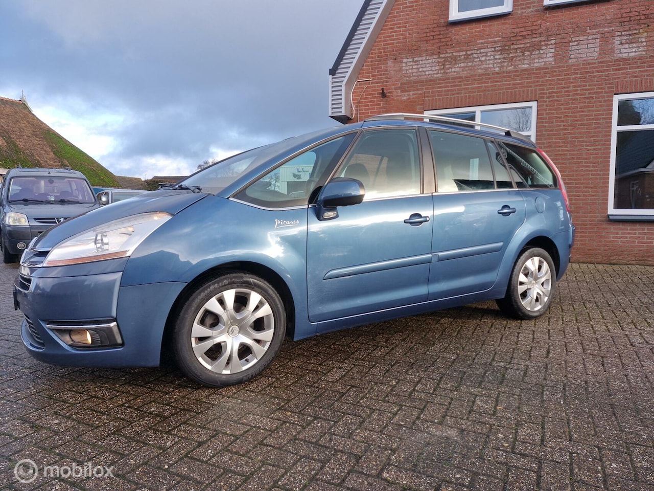 Citroën Grand C4 Picasso - 1.6 VTi Prestige 7p. 1.6 VTi Prestige 7p. - AutoWereld.nl