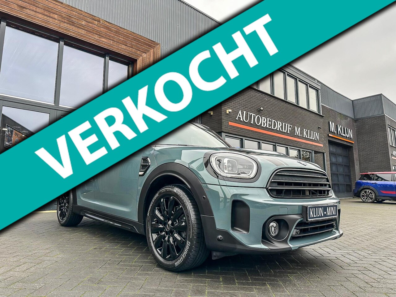 MINI Countryman - Mini 1.5 Cooper Business Edition Blackline aut/Sage Green/pano/navi/camera/led - AutoWereld.nl