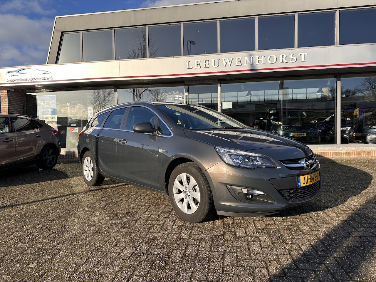 Opel Astra Sports Tourer - 1.4 Turbo Blitz 1.4 Turbo Blitz, navi, airco, cruise, PDC, trekhaak, NL-auto - AutoWereld.nl