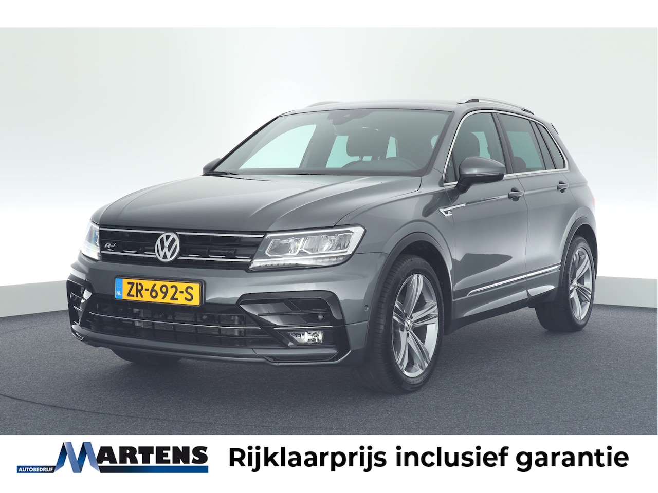 Volkswagen Tiguan - 1.5 TSI 130pk H6 R-Line Comfortline Trekhaak 360Camera Virtual Cockpit Navigatie - AutoWereld.nl