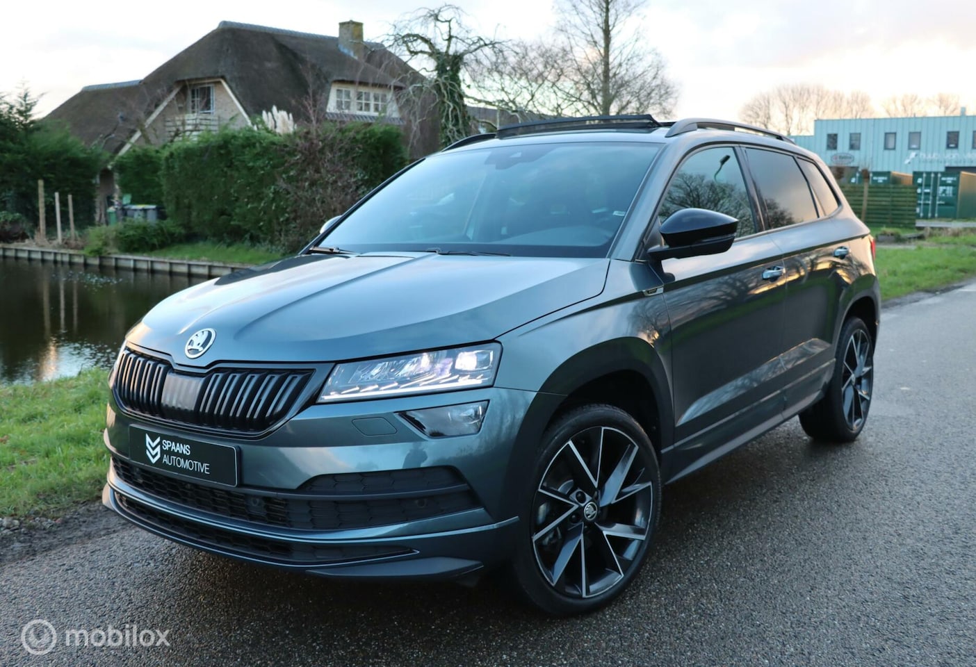 Skoda Karoq - 1.5 TSI ACT Sportline / Pano / Virtual / Camera - AutoWereld.nl