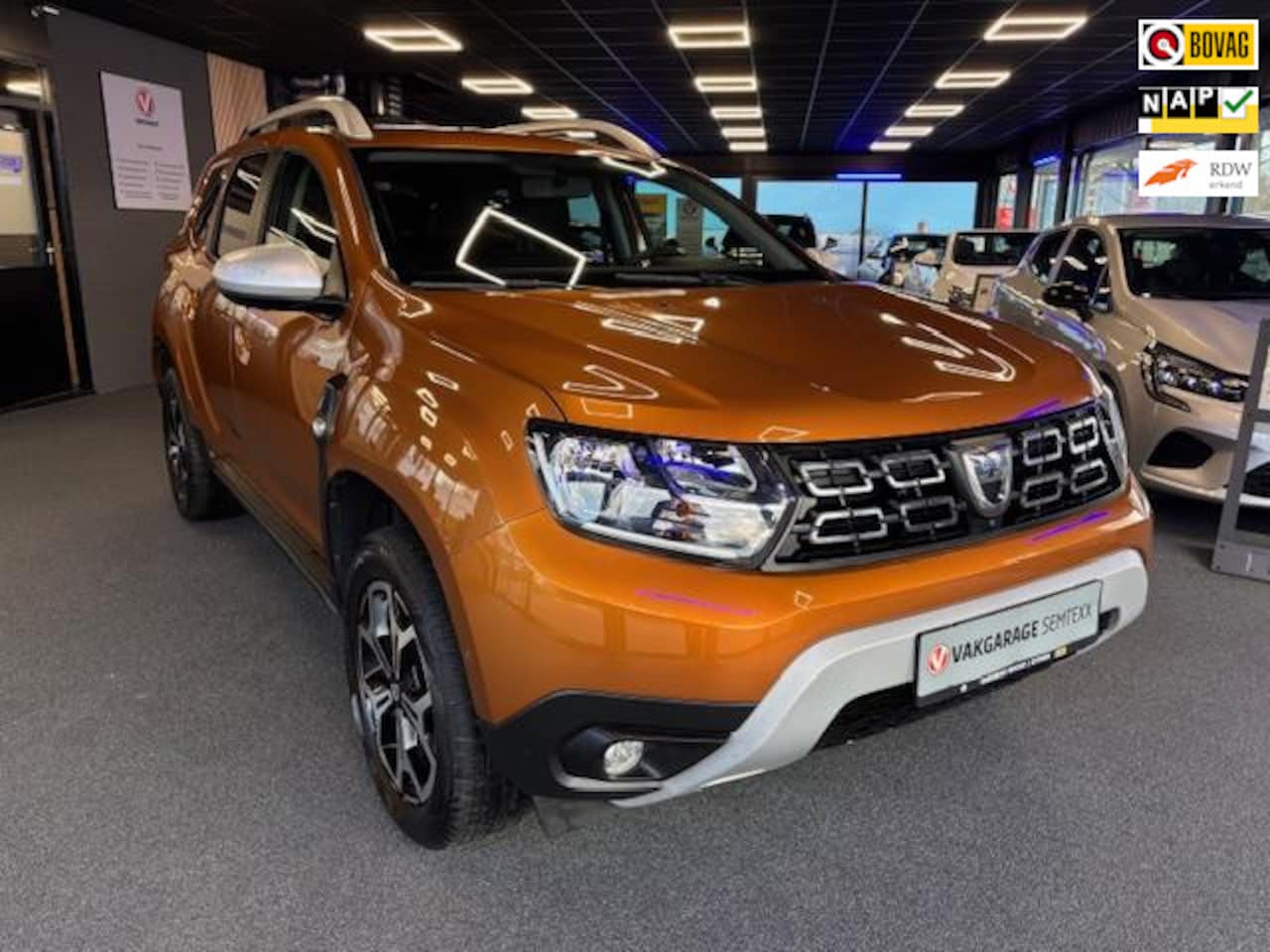 Dacia Duster - 1.0 TCe Prestige | Cruise | Clima | Camera | All-Season Banden | Slechts 84.000 KM | APK 1 - AutoWereld.nl