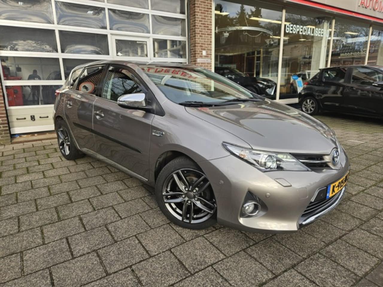 Toyota Auris - 1.8 Hybrid Executive Xenon/Pdc - AutoWereld.nl