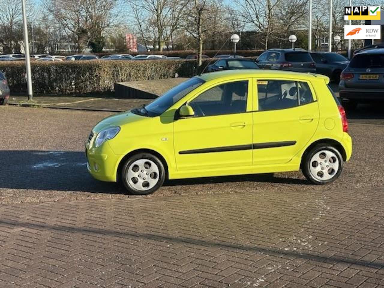 Kia Picanto - 1.0 Seven 1.0 Seven,bj.2010,kleur:lemon/geel,5 deurs,airco,NAP met 158537 km.en APK 01/2026,stuurbek - AutoWereld.nl