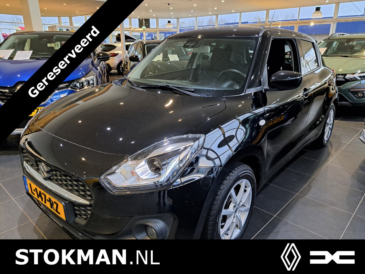 Suzuki Swift - 1.2 Comfort Smart Hybrid | Navi by App | Airco | Adaptive Cruise | Camera | Zomer & Winter - AutoWereld.nl