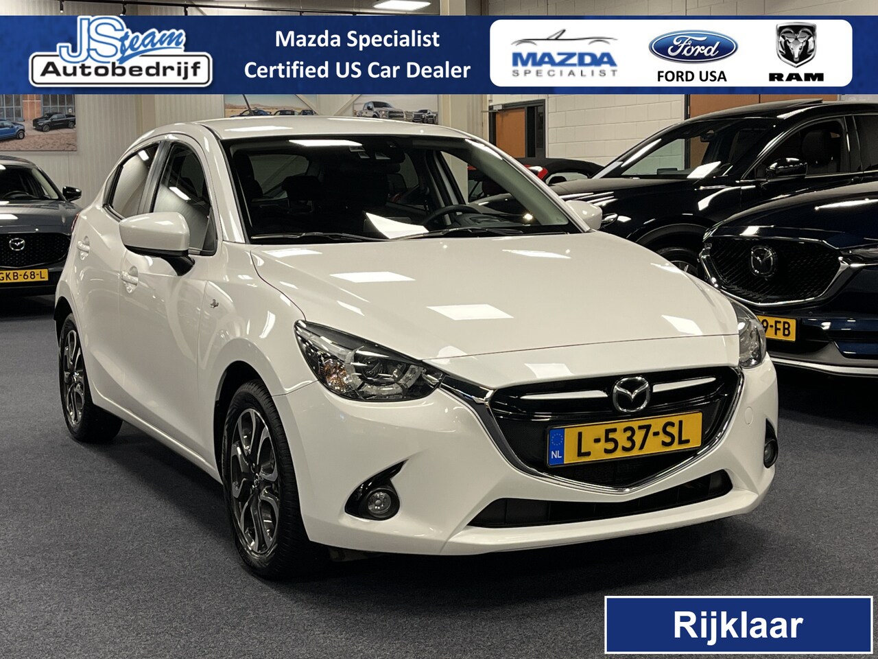 Mazda 2 - 1.5i SkyActiv-G GT-M Automaat Driver Pack Navi - AutoWereld.nl