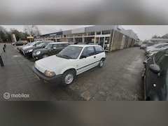 Honda Civic - 1.3 Luxe