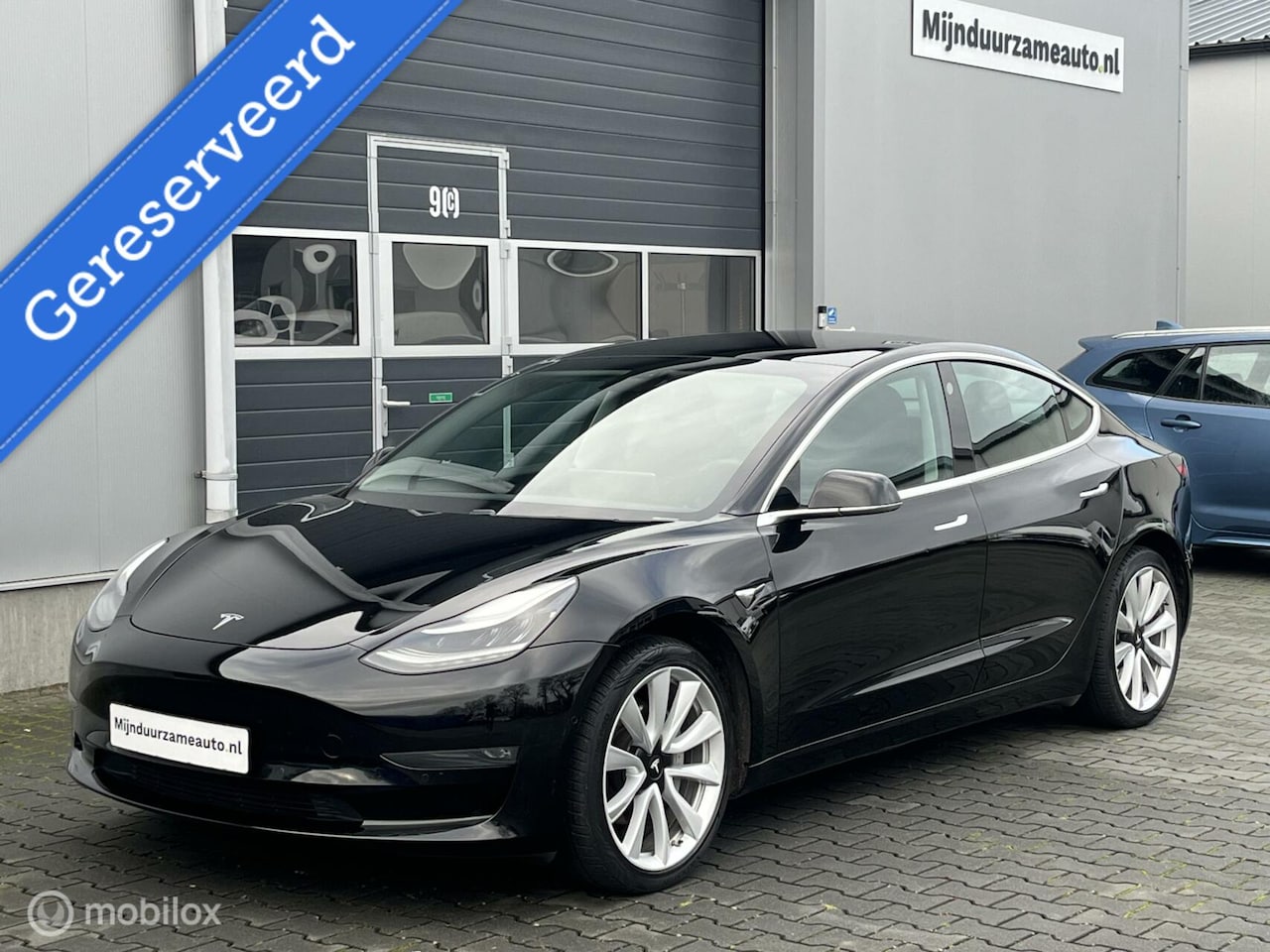 Tesla Model 3 - Long Range RWD Long Range AWD 75 kWh - Trekhaak - 19 inch - AutoWereld.nl