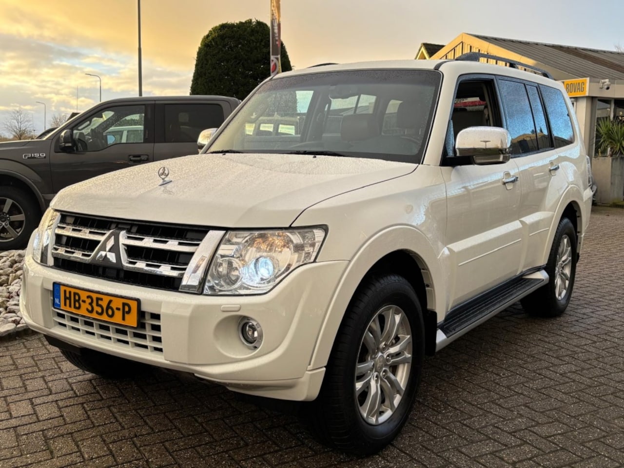 Mitsubishi Pajero - 3.8 V6 Instyle 7-Persoons 2014 Wit Schuifdak - AutoWereld.nl